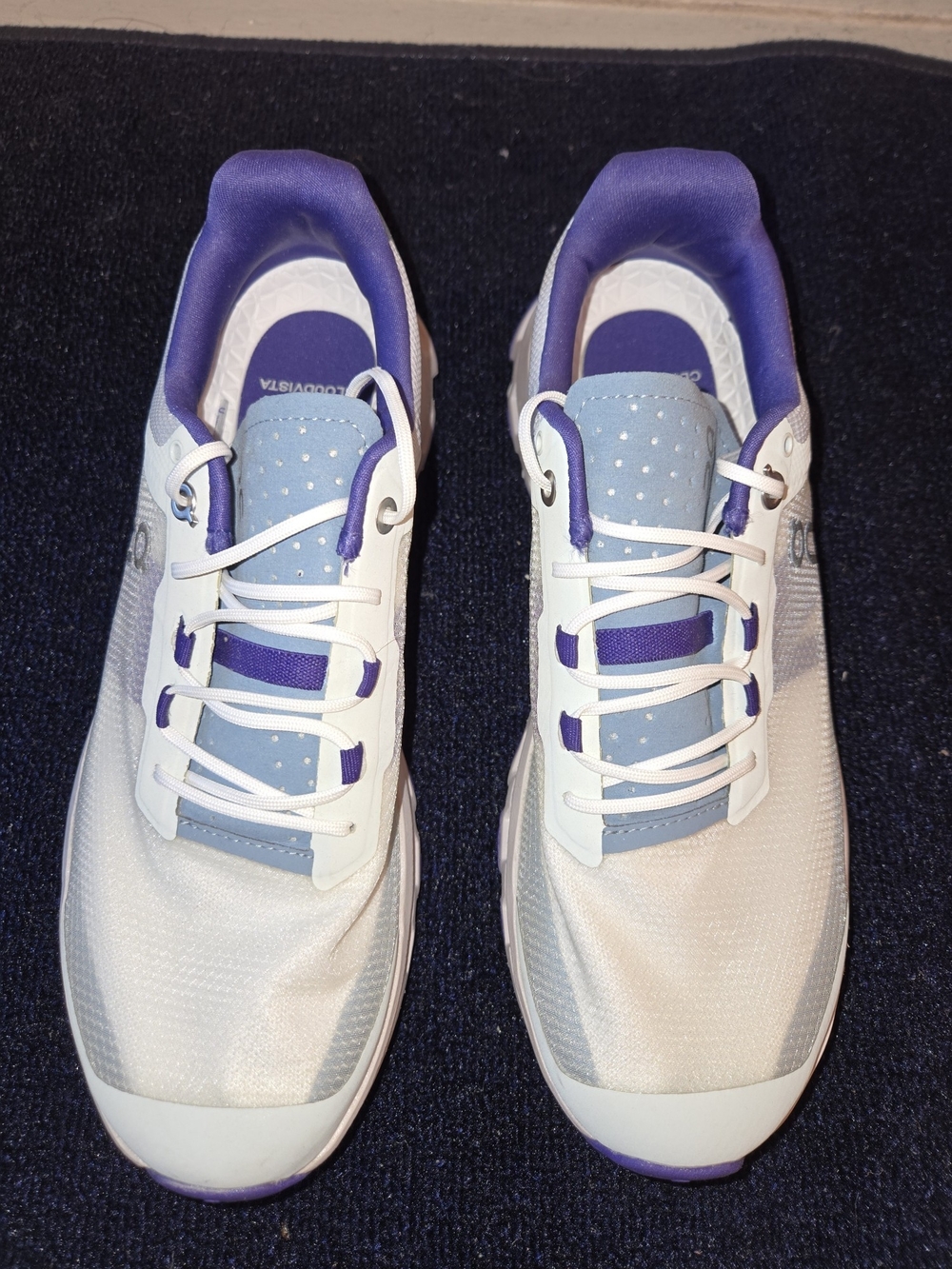On Running Women’s White and Purple Athletic Sneakers